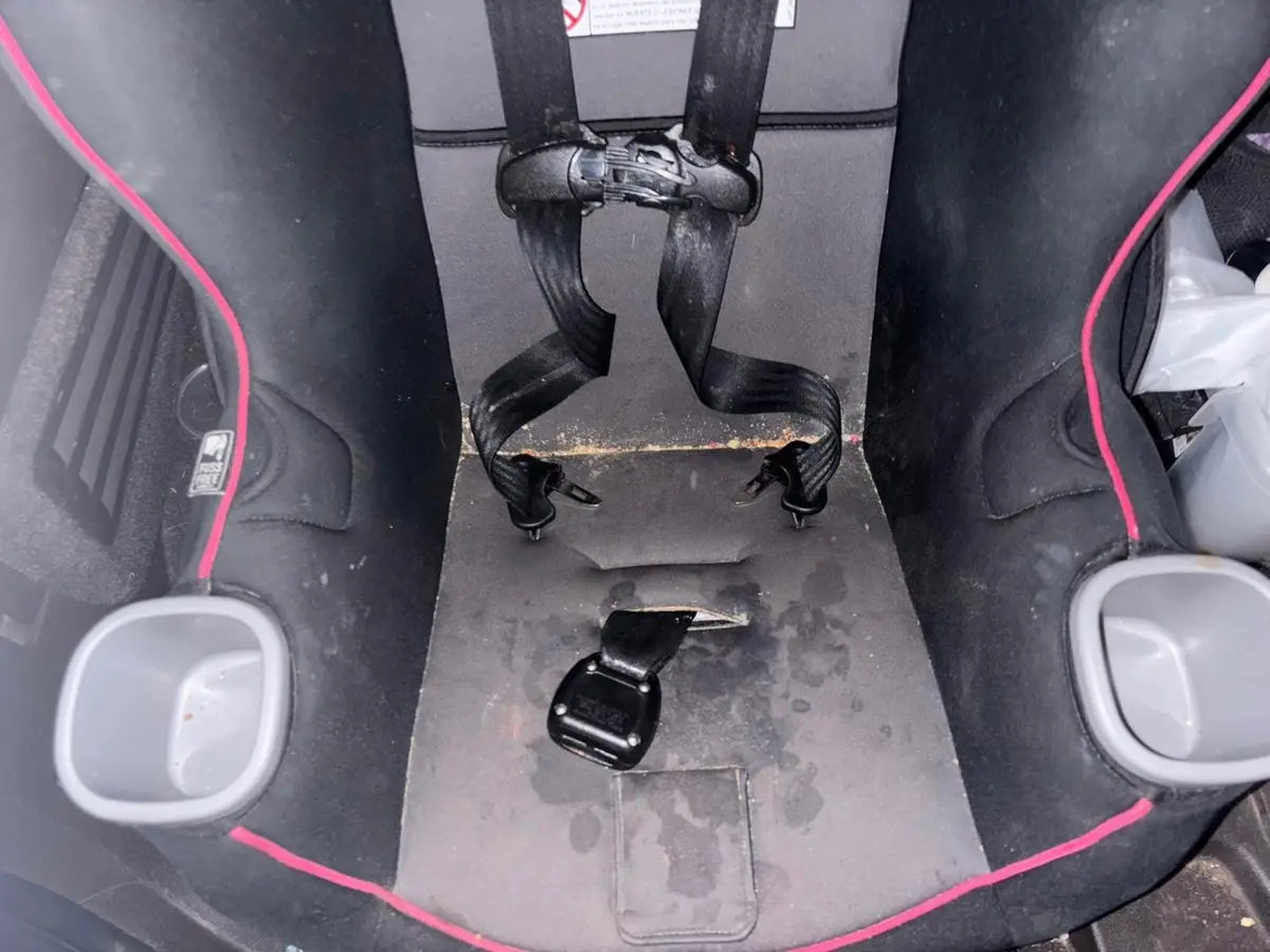 Gray car seat before cleaning